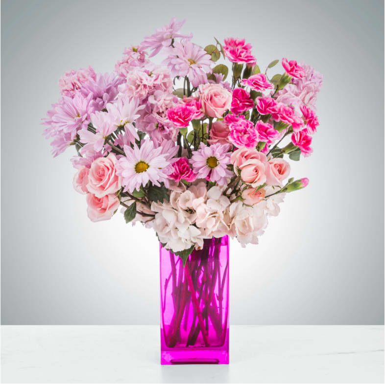 Always a Princess by BloomNation™ - Whoever said orange is the new pink was seriously disturbed - Elle Woods. This arrangement is perfect for anybody who loves the color pink and wants something that pops! A great gift for wishing somebody a happy birthday in their favorite color or celebrating a new baby.   Approximate Dimensions: 12"D x 18"H