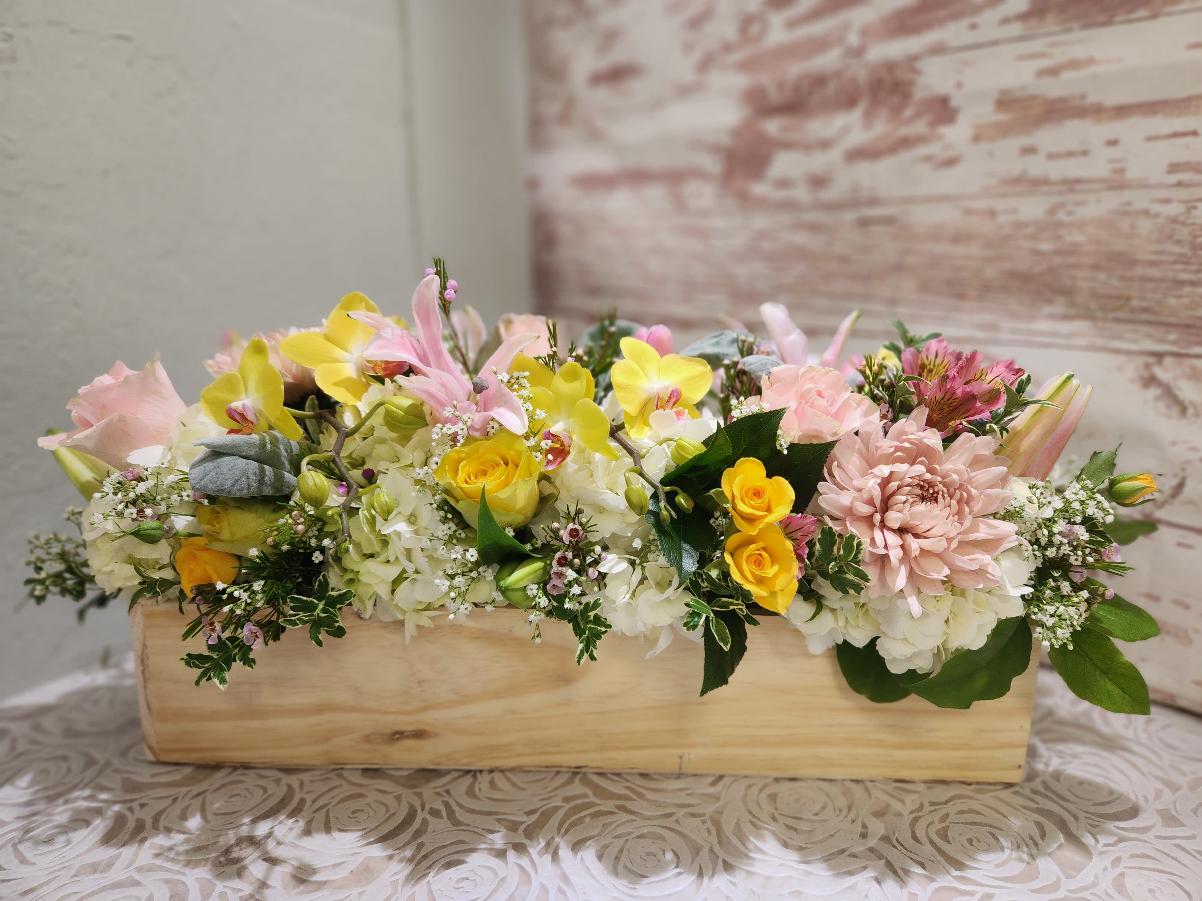 Spring low Centerpiece wood box - A beautiful low and low style arrangement designed in a wood box appx 20" long Soft pastels colors, can be made in other color tones by request. 