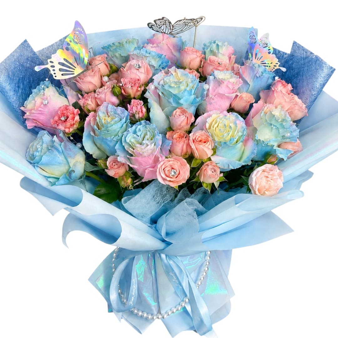 Bouquet of pastel roses wrapped in blue paper with butterfly picks