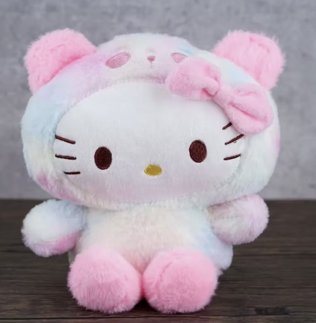 Pastel Hello Kitty plush toy with a pink bow