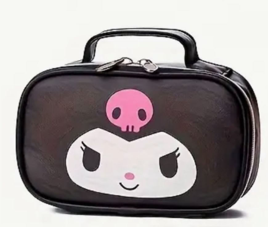Black cosmetic bag with a cartoon face and pink skull graphic