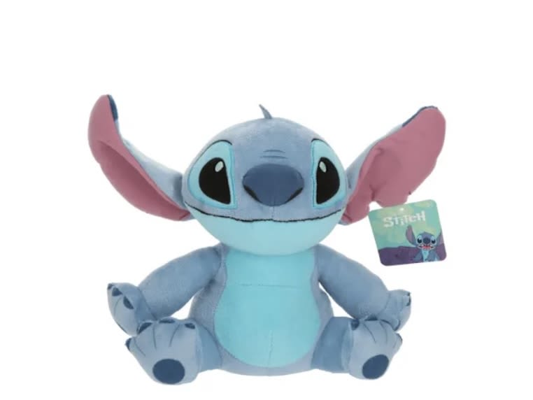 Blue Stitch plush toy with pink ears and a hanging tag