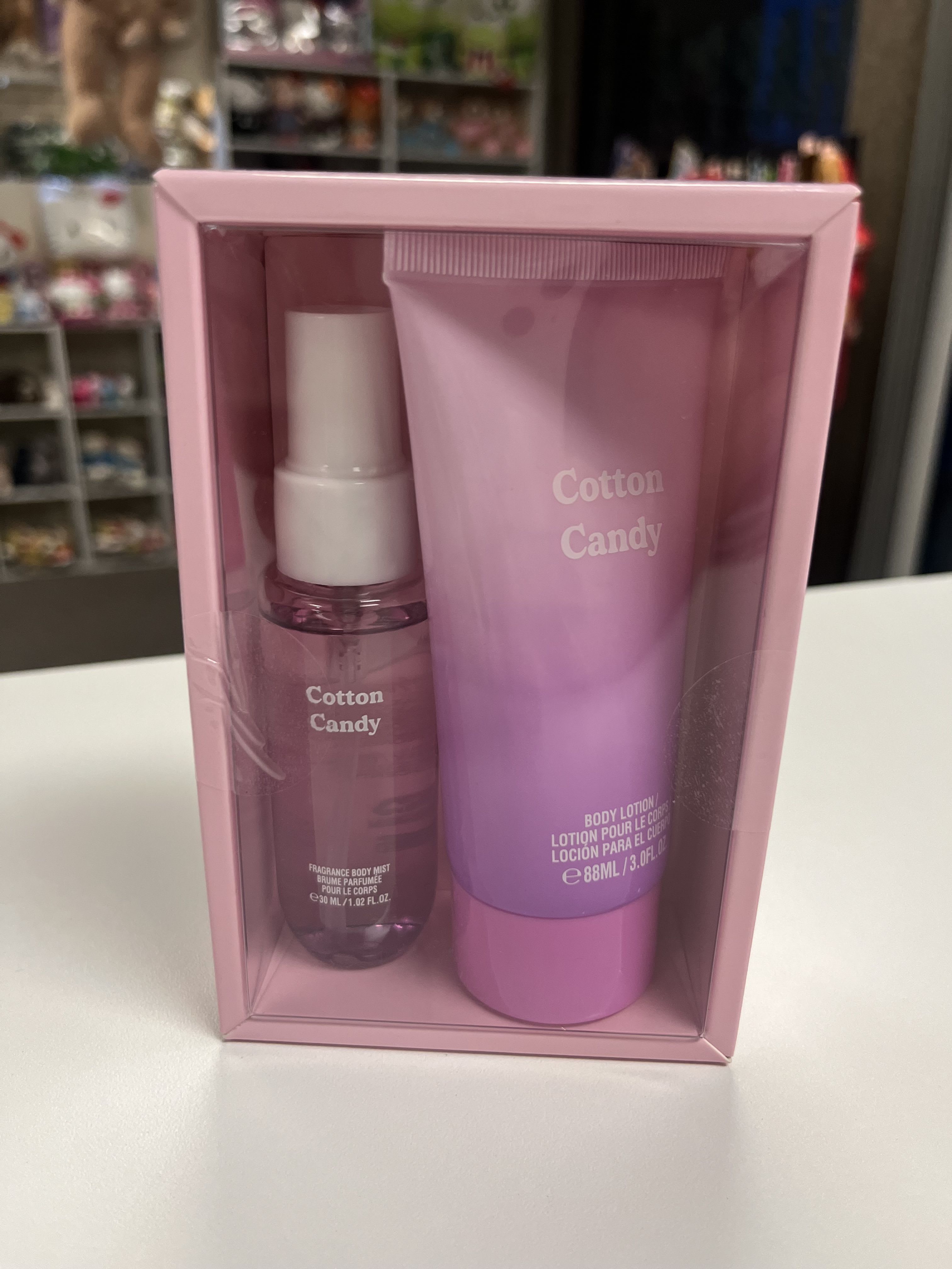 Pink gift set with body mist and lotion in a box