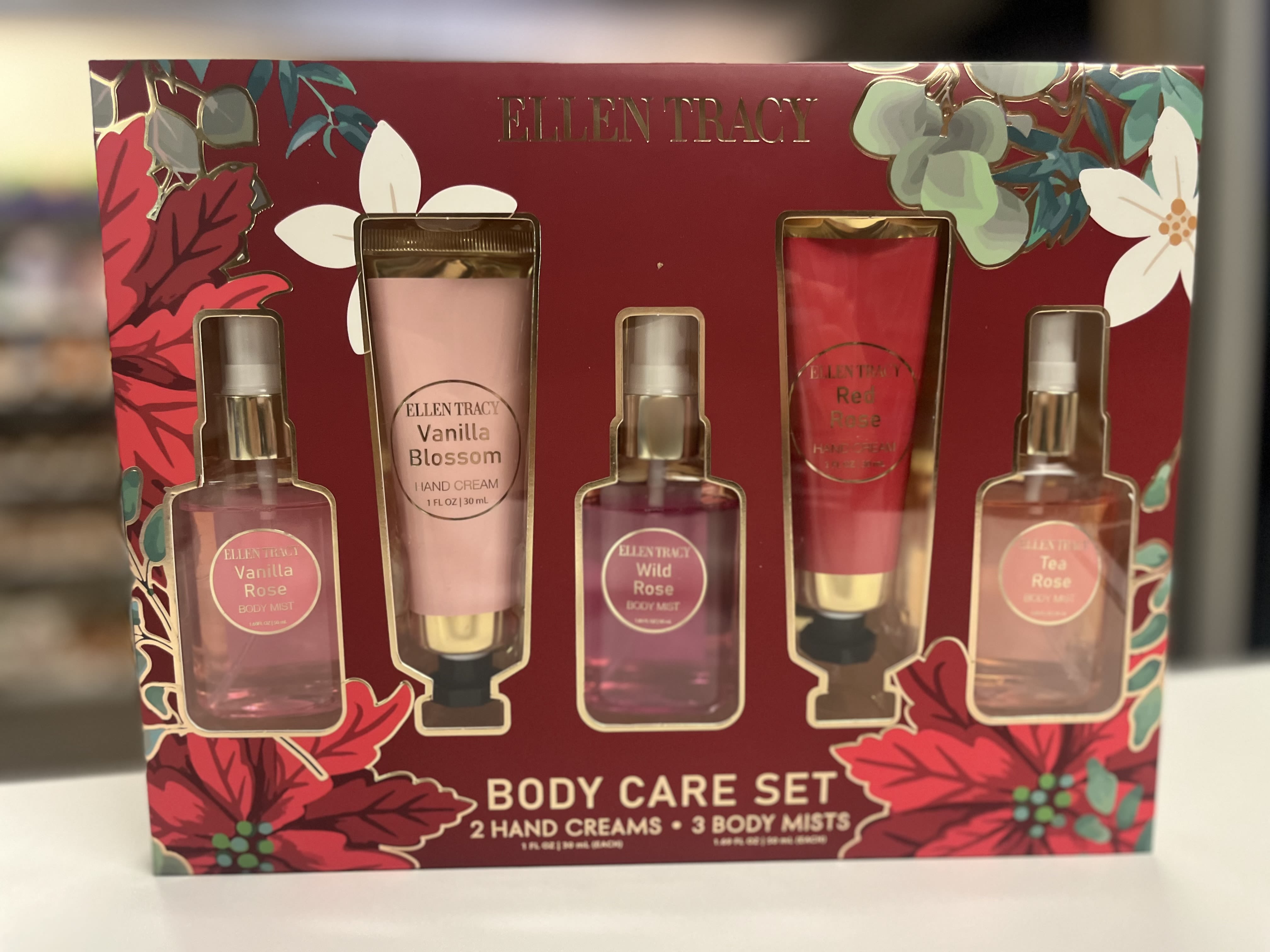 Ellen Tracy body care gift set with lotions and body mists in a floral box