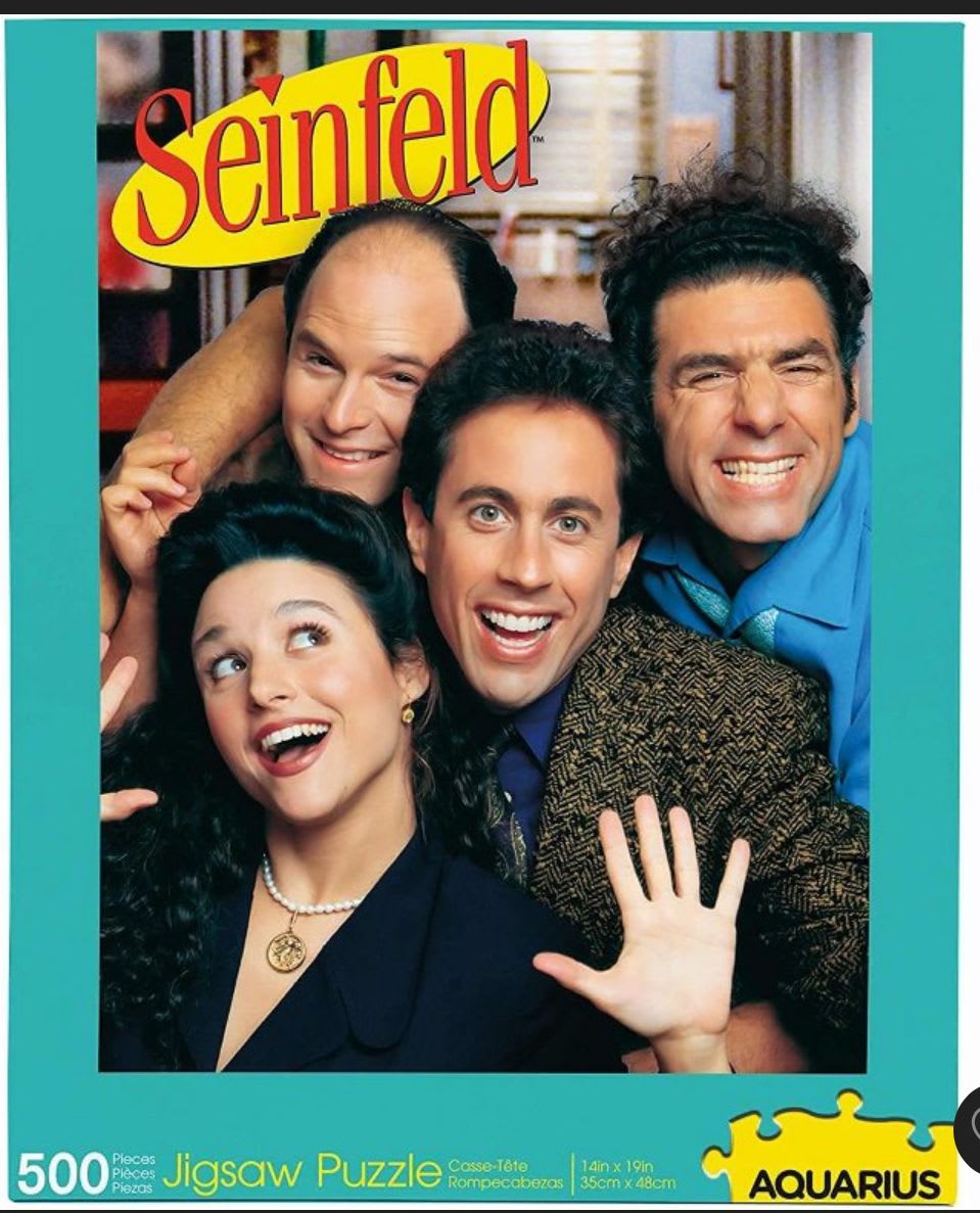 Seinfeld jigsaw puzzle box with cast photo and logo