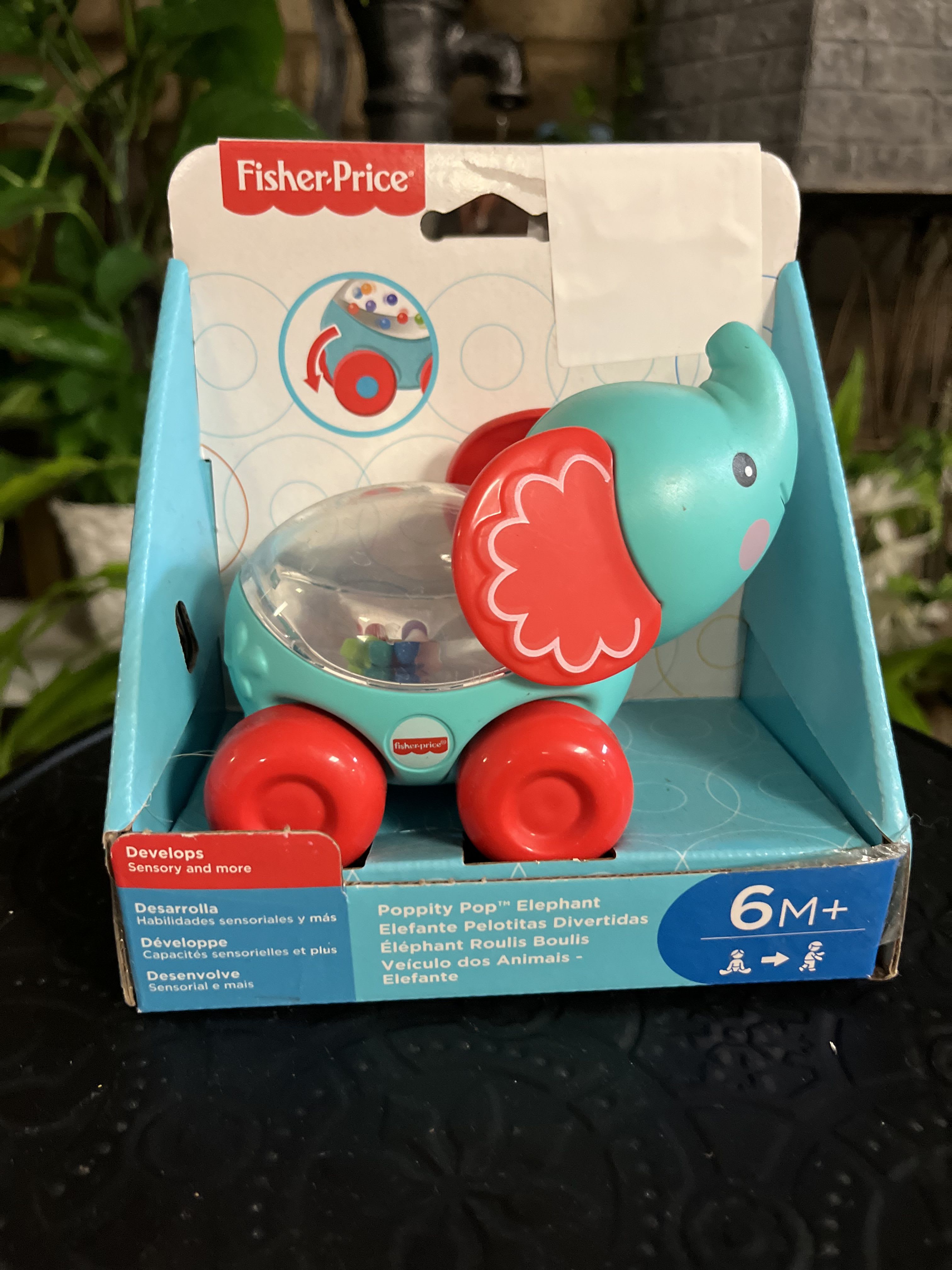 Fisher-Price elephant toy in retail packaging