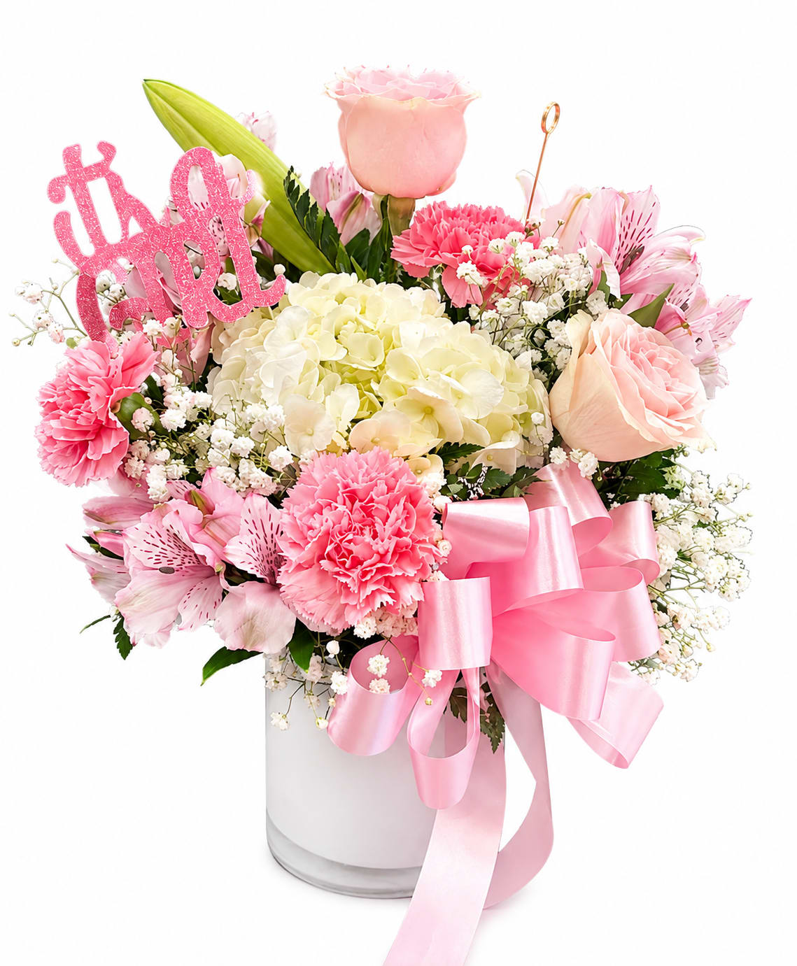 Pink and cream flower arrangement in a glass vase with a ribbon and "it's a girl" sign