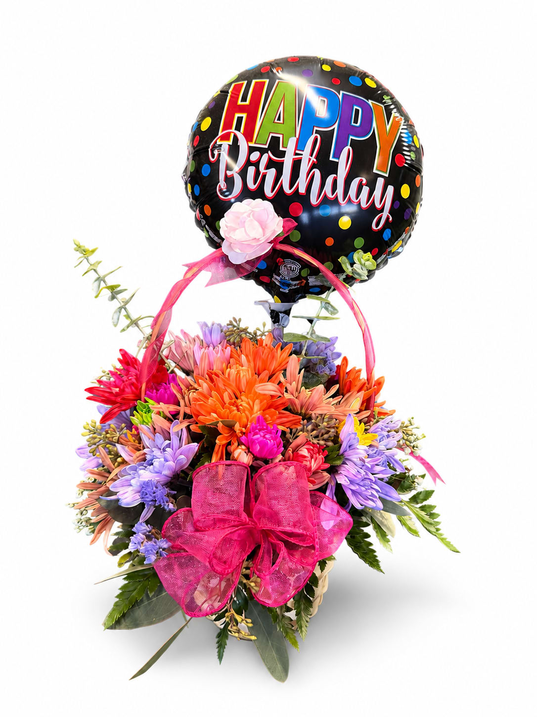 Birthday balloon above a colorful mixed flower basket with a pink bow