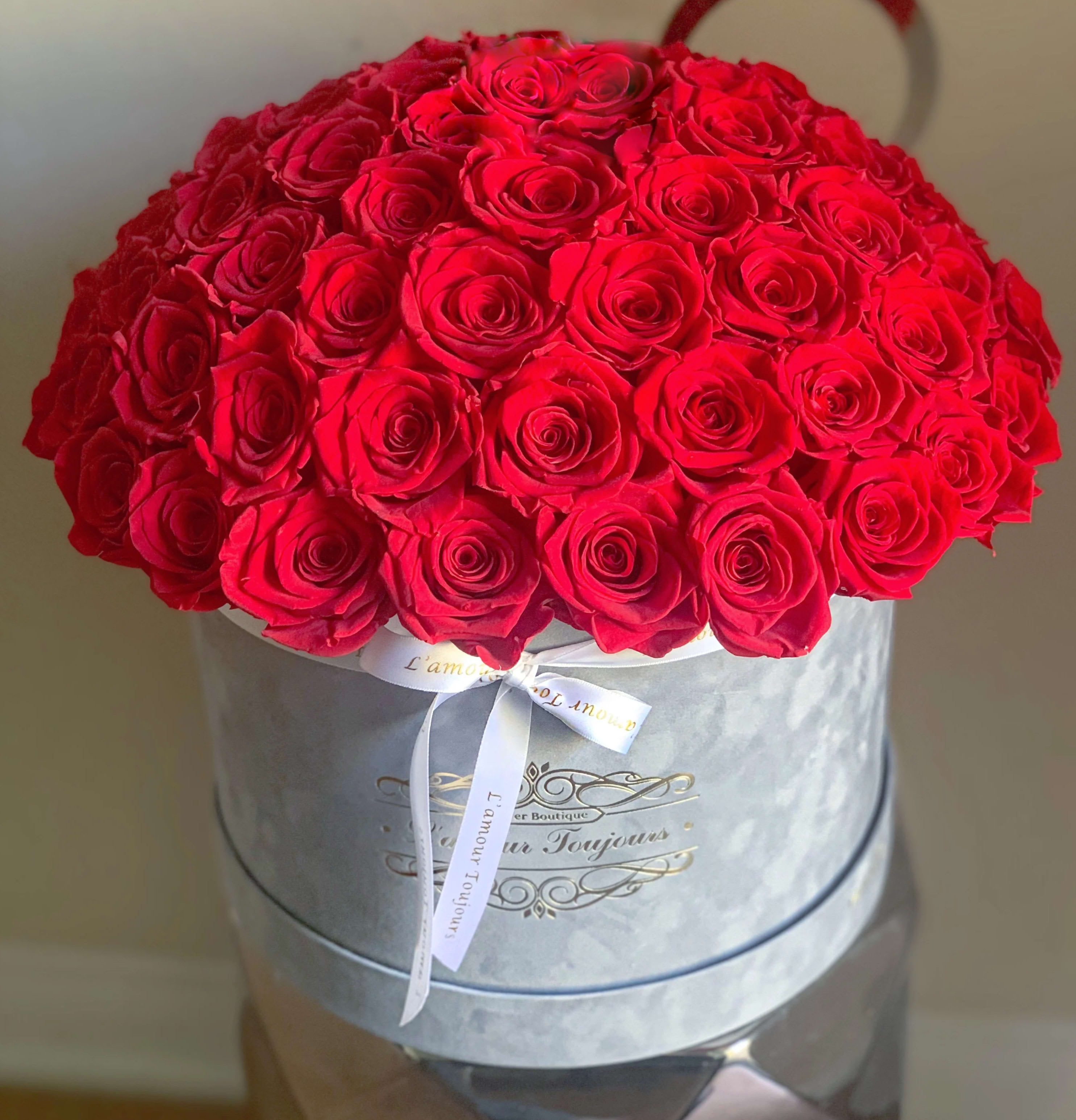 Everlasting Love Grand Signature Box - Real Roses that last up to 3 years - • Everlasting roses are preserved real roses that last up to 3 years! By treating fresh roses with a unique method these roses become long lasting and keep their natural beauty, structure and softness.  • Make a statement with our exquisite Ecuadorian real roses that bring uniqueness and sophistication to life.  • Send stunning roses to your loved ones, a wife, a husband, a parent or a friend to let them know you remembered their special day.  • Zero maintenance required: Everlasting roses hold tenderness and a natural fresh look, with no maintenance required. 