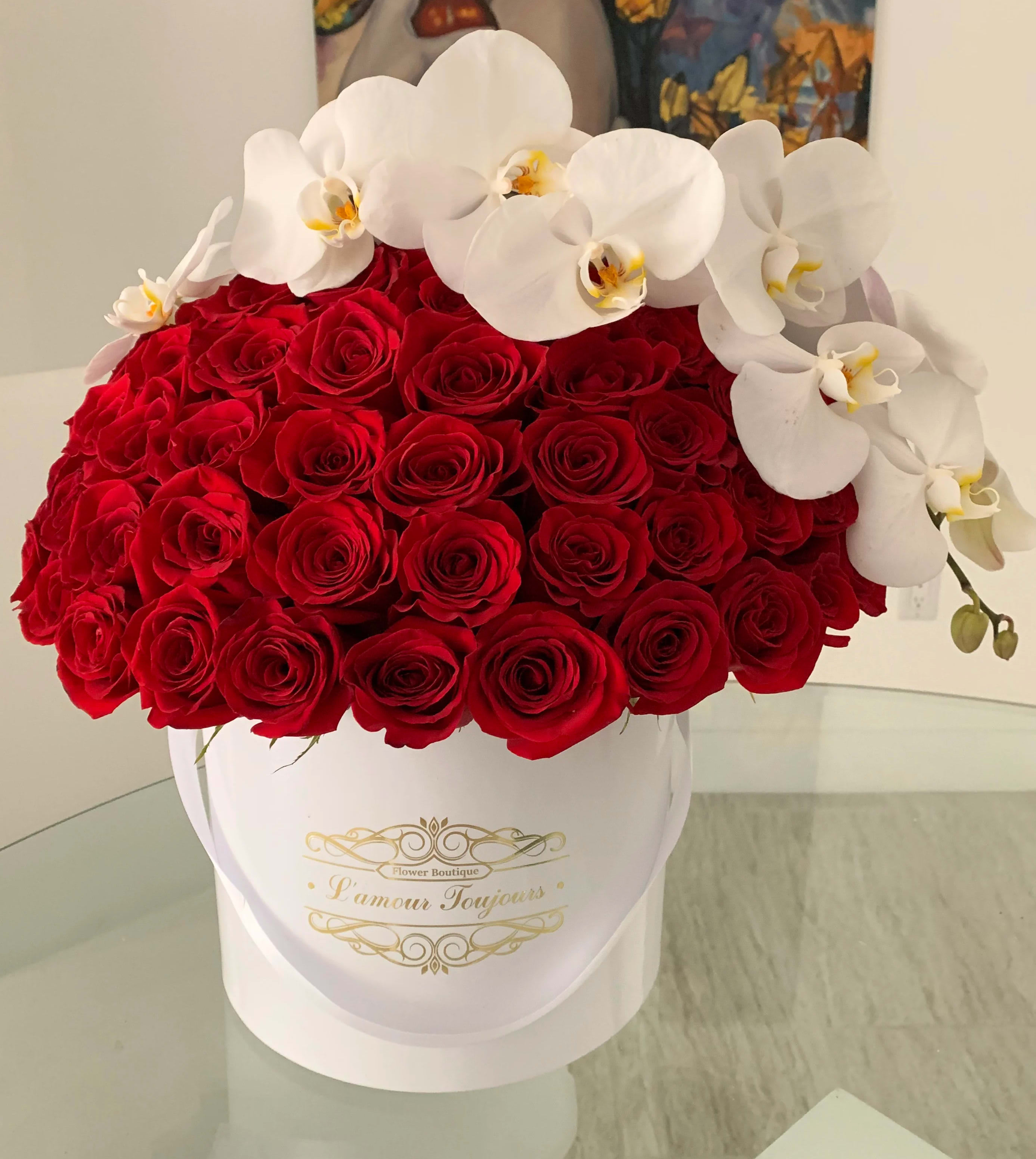 Viva Las Vegas Signature Flower Box - 50 Fresh Roses with a stem of premium orchids in our Signature Box