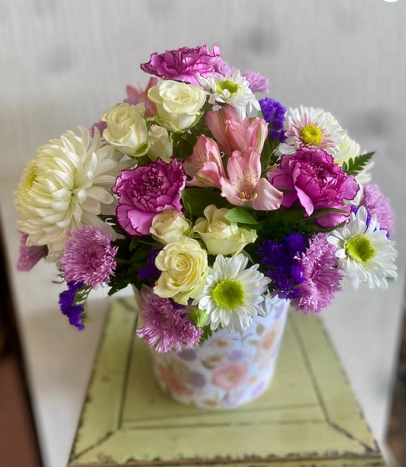 Lavender Love - A pretty floral container filled with long lasting blooms in shades of pink, lavender, and white. 