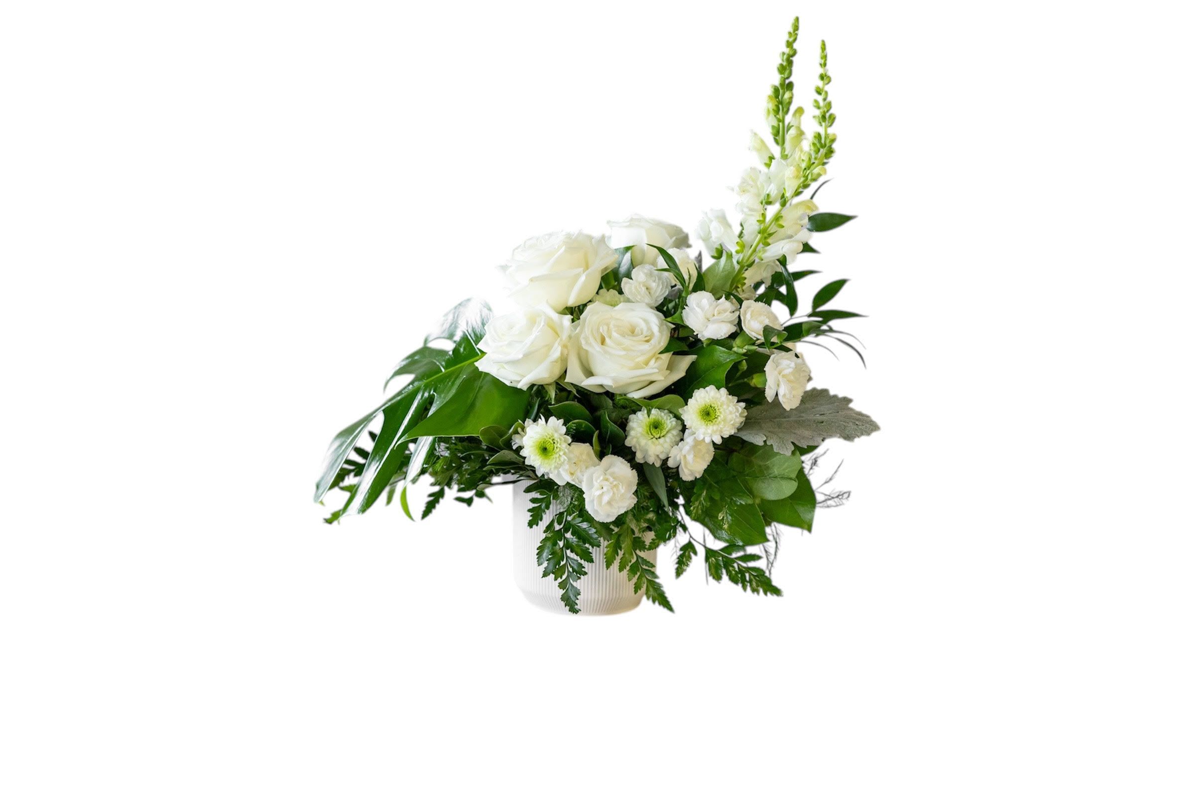White rose and chrysanthemum arrangement in a white vase