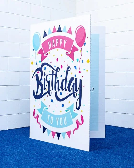 Birthday greeting card with balloons and confetti