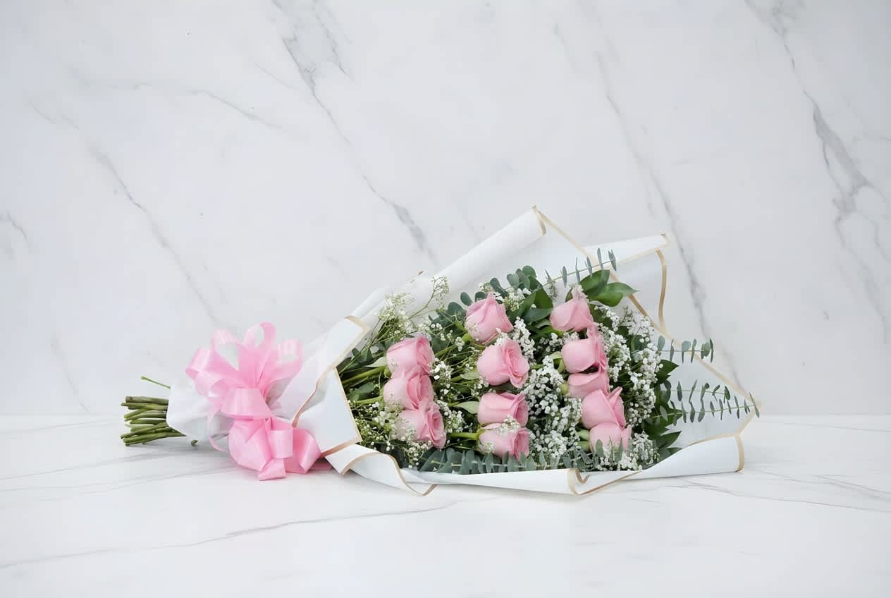 Pink Roses Cascading Bouquet - Pink roses(or another color if you wish), wrapped in cascading fashion to give more volume to the bouquet. Elegance in simplicity. Item can be customized if you wish to give us a call at 832 916 3636. Thank you!