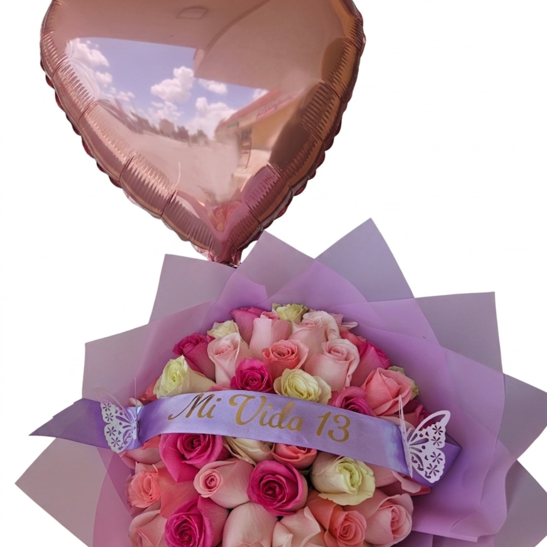 Pink and lavender rose bouquet with a heart balloon and ribbon