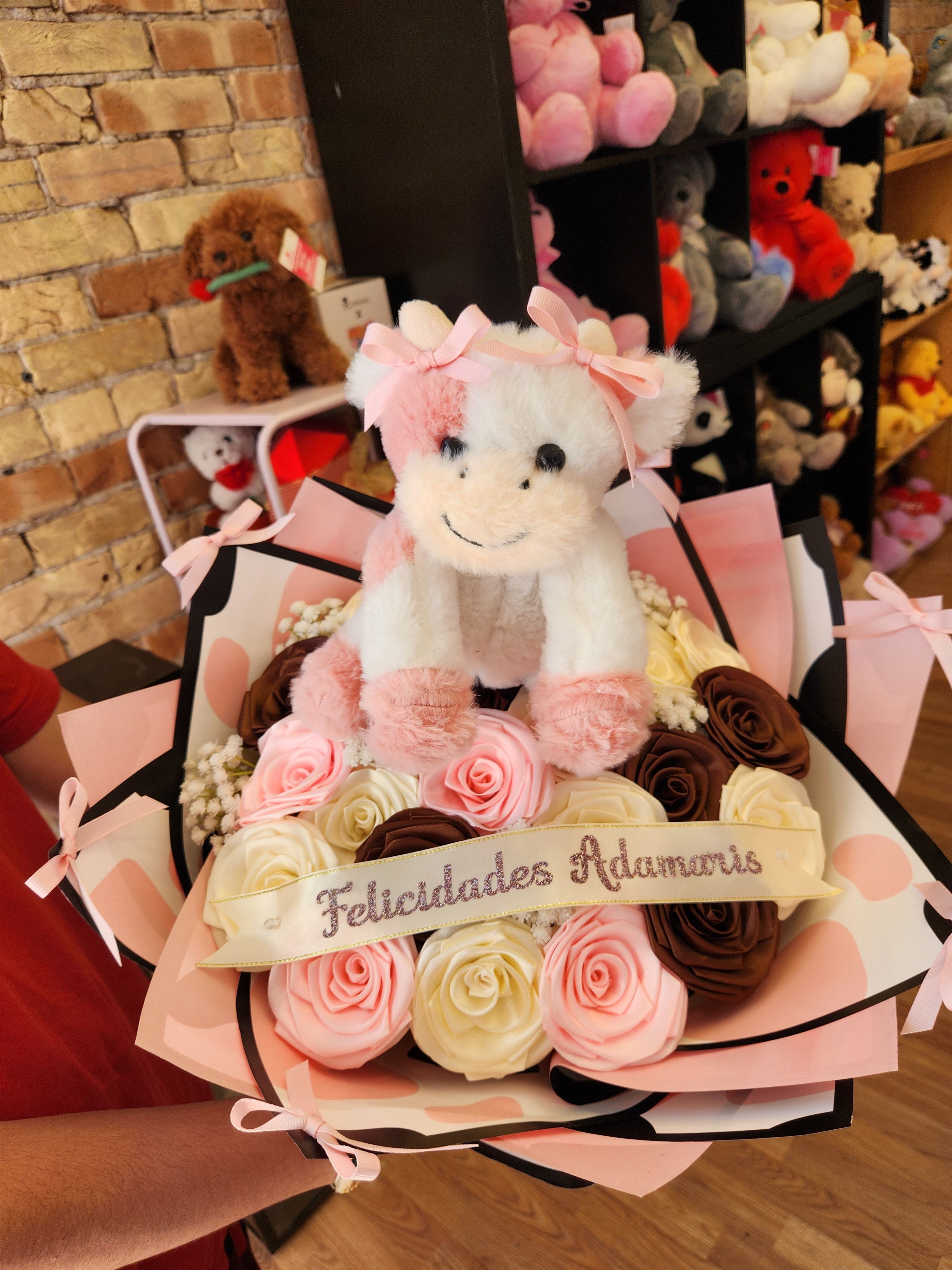 Plush teddy bear bouquet with pink and cream roses