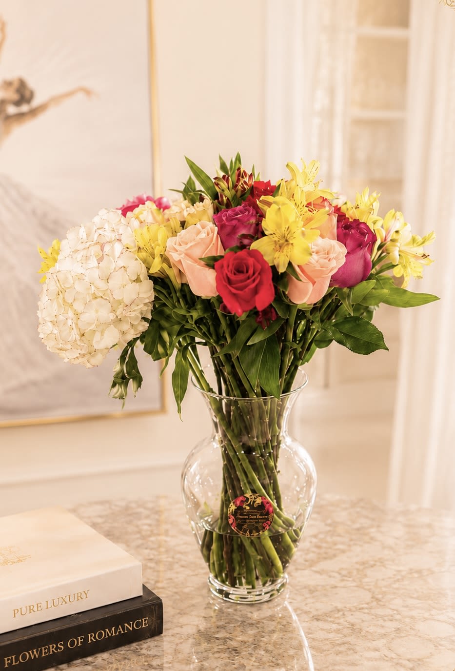 Vibrant Harmony - Hydrangea with multicolor of fresh flowers for any Occassion. Is the best present for any event. This bouquet is a radiant celebration of nature's finest artistry- a harmonious blend roses, hydrangeas, and asters, each bloom chosen for its beauty, character, and charm.  It's a living expression of color, grace, and emotion.