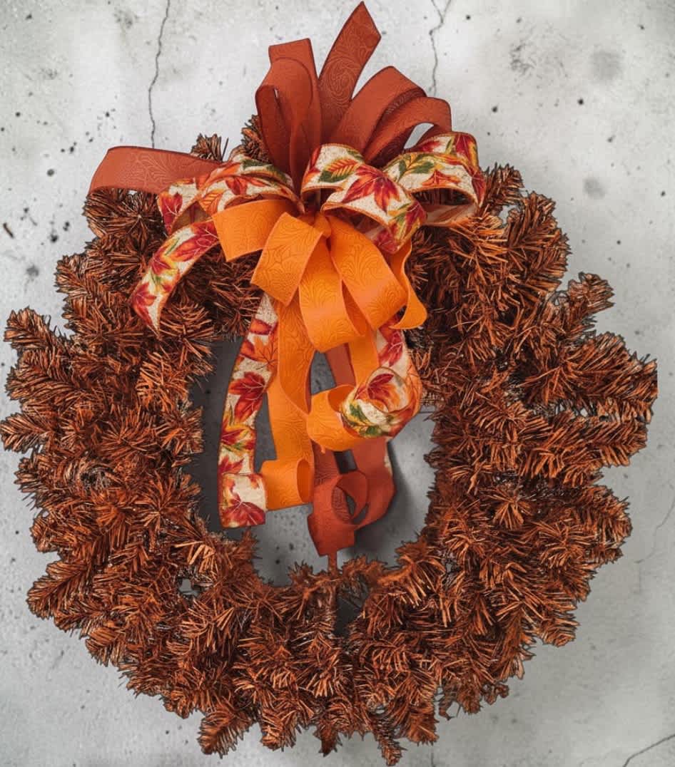 Autumn wreath with orange and brown ribbon bow