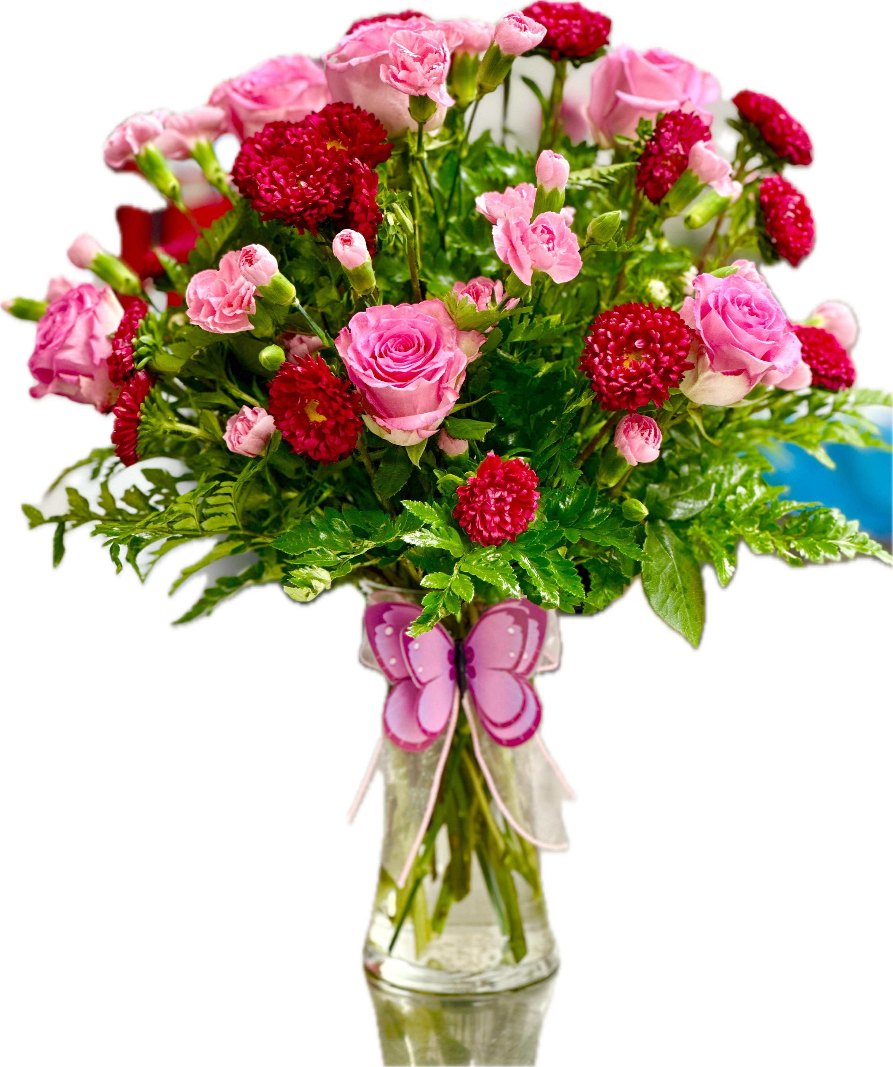 The Precious Heart Bouquet - The Precious Heart Bouquet  is a blushing display of loving kindness. Fuchsia roses are sweetly stunning amongst red Matsumoto asters, pink mini carnations and lush greens. Arranged in a classic clear glass vase, this bouquet boasts pink perfection to convey your warmest wishes. 