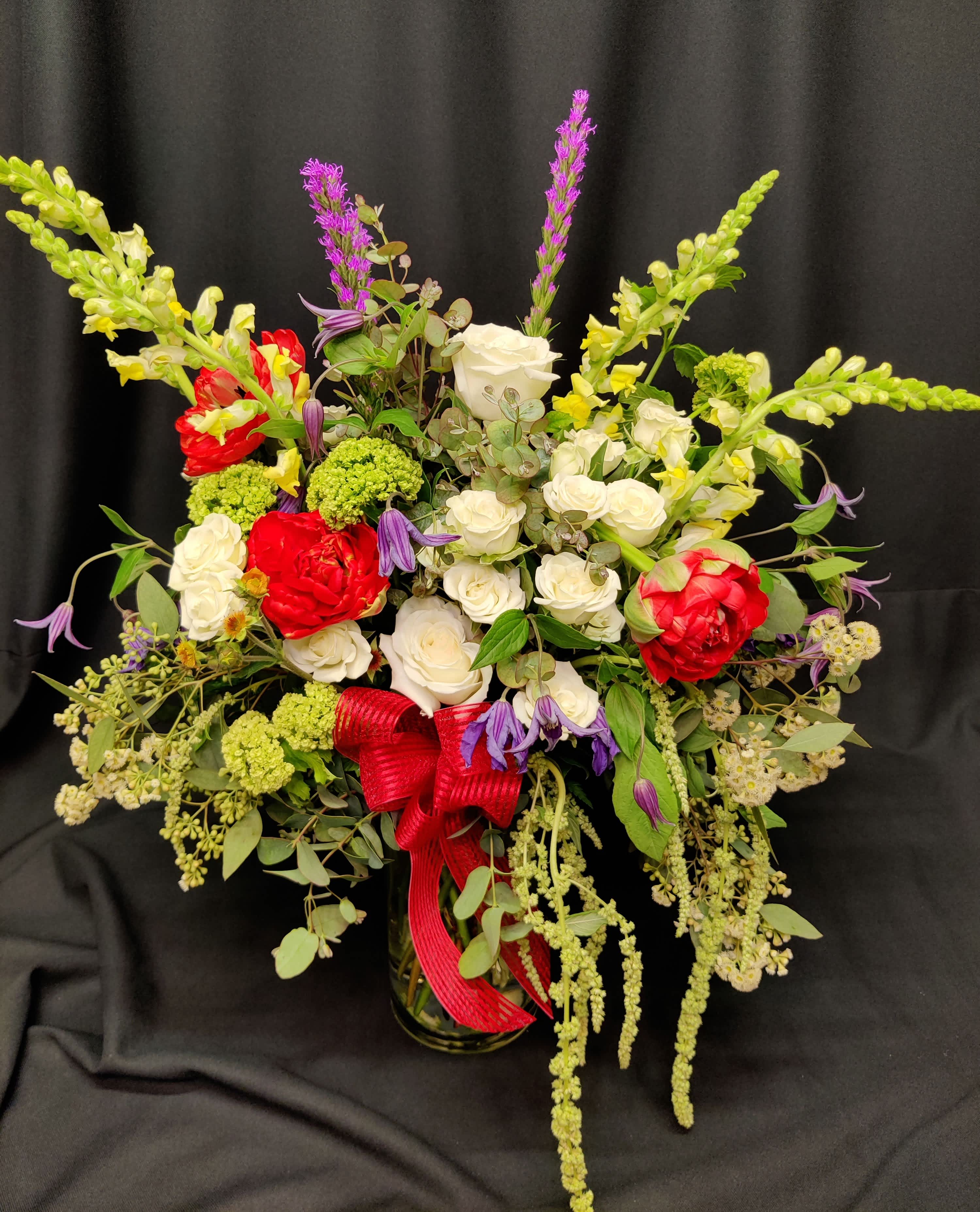 Romantic Peony Tulip Rose Bouquet - Unusual peony tulips and roses with dripping amaranth, snowball and clematis are just examples of the rare fantastic flowers you'll find at Flower Fiesta.    Your design will vary as our selection of premium rare flowers changes weekly.  Be Sure to order at Least a week prior.    Perfect for a special anniversary.