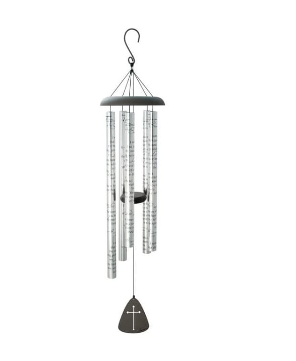 Silver metal wind chime with printed text and black sail featuring a white cross