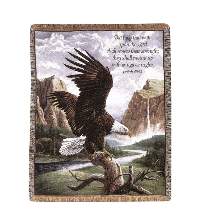 Woven throw blanket with a soaring bald eagle over a mountain landscape and scripture text