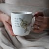 We Can Do This One Day at A Time Mug with Coaster Lid and Custom Arrangement - This gift of hope and healing is great for gifting to a recovering friend. This bone china mug with coaster lid is 17 oz. and reads "We can do this one day at a time."