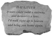 Stone plaque with a memorial quote engraved on it