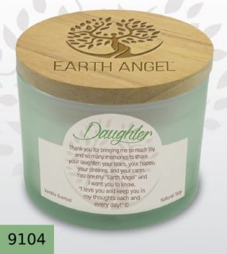 Mint green memorial candle in a glass jar with a wooden lid