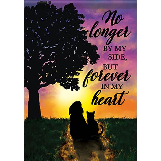 Memorial plaque with a tree, cat and dog silhouettes, and a sunset quote