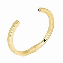 Gold-toned open cuff bracelet on a white background