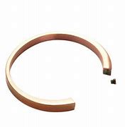 Broken brown and cream circular band on a white background