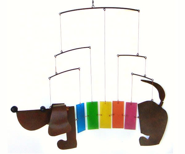 Colorful hanging mobile with dog shapes and rectangular panels