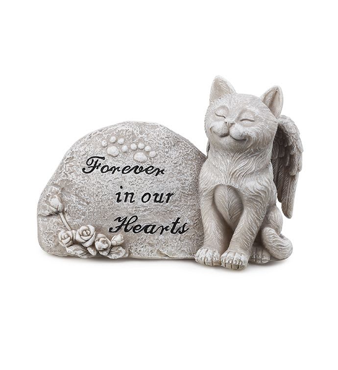 Stone memorial with a sleeping cat figurine and the words "Forever in our Hearts"