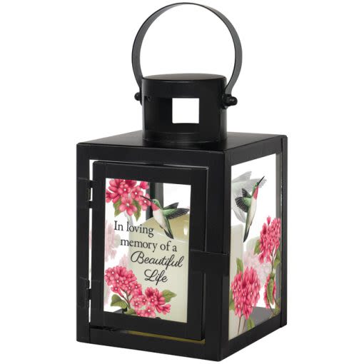 Black memorial lantern with pink floral panels and a hummingbird design