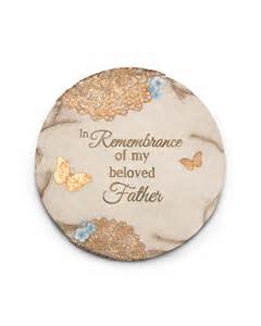 Round memorial plaque with butterflies and text for a beloved father