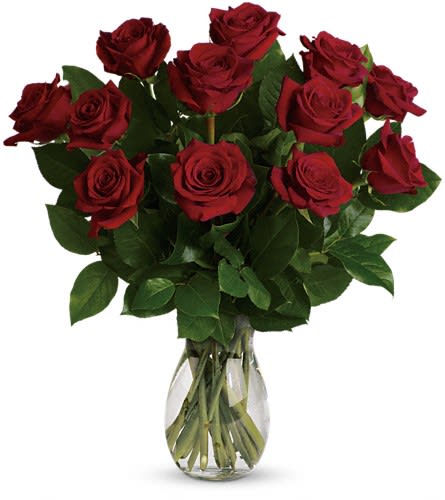 Bouquet of red roses in a clear glass vase