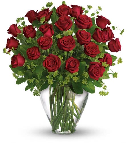 Bouquet of red roses in a clear glass vase