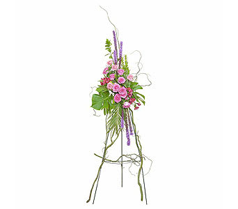 Tall floral standing spray with pink blooms and purple spikes