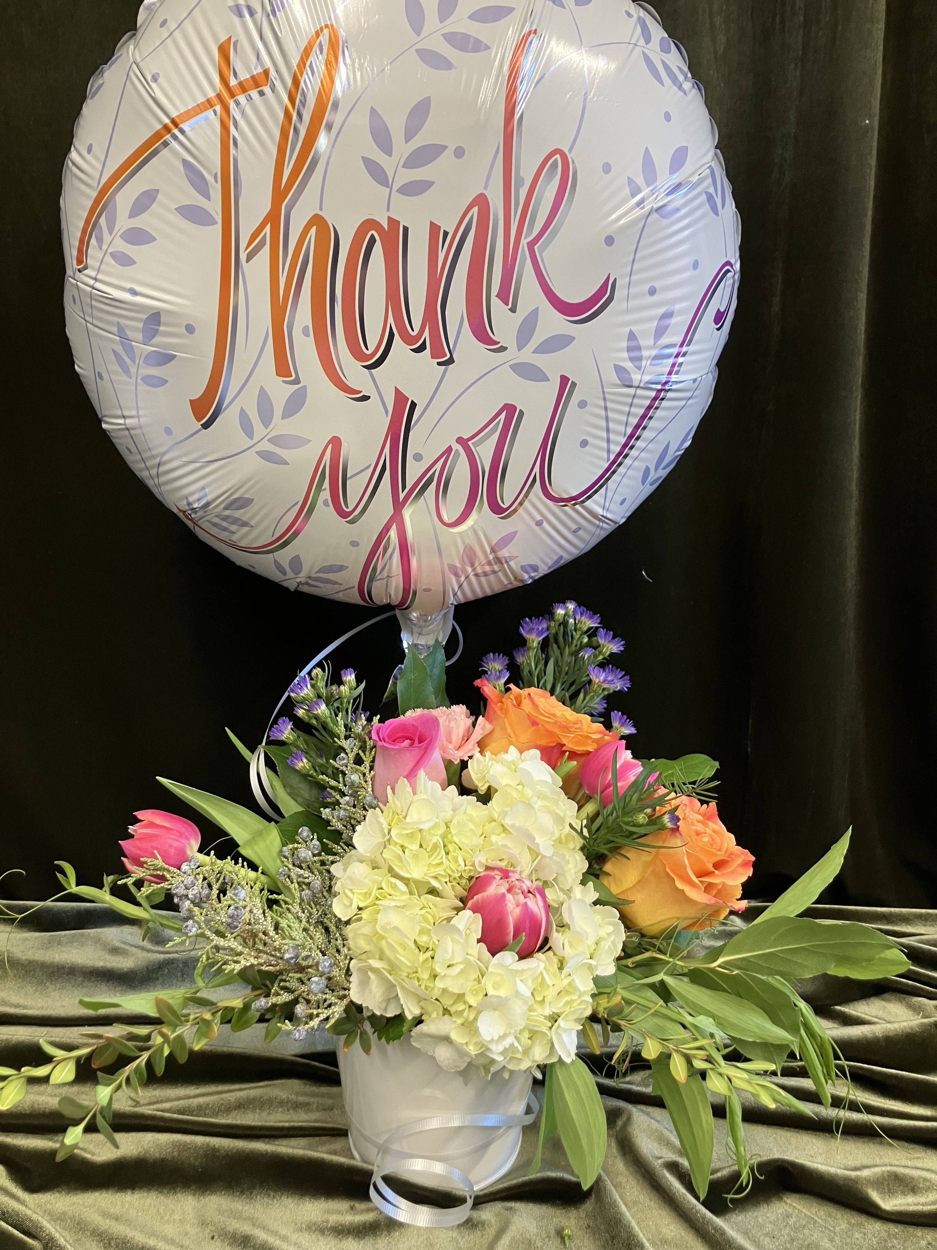 Say Thank You with Flowers  - Fresh flowers will warm the heart and will brighten the room, paired with a thank you Mylar balloon! 