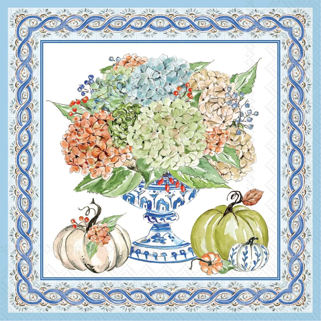 Watercolor floral arrangement in a blue pedestal vase with pumpkins around it