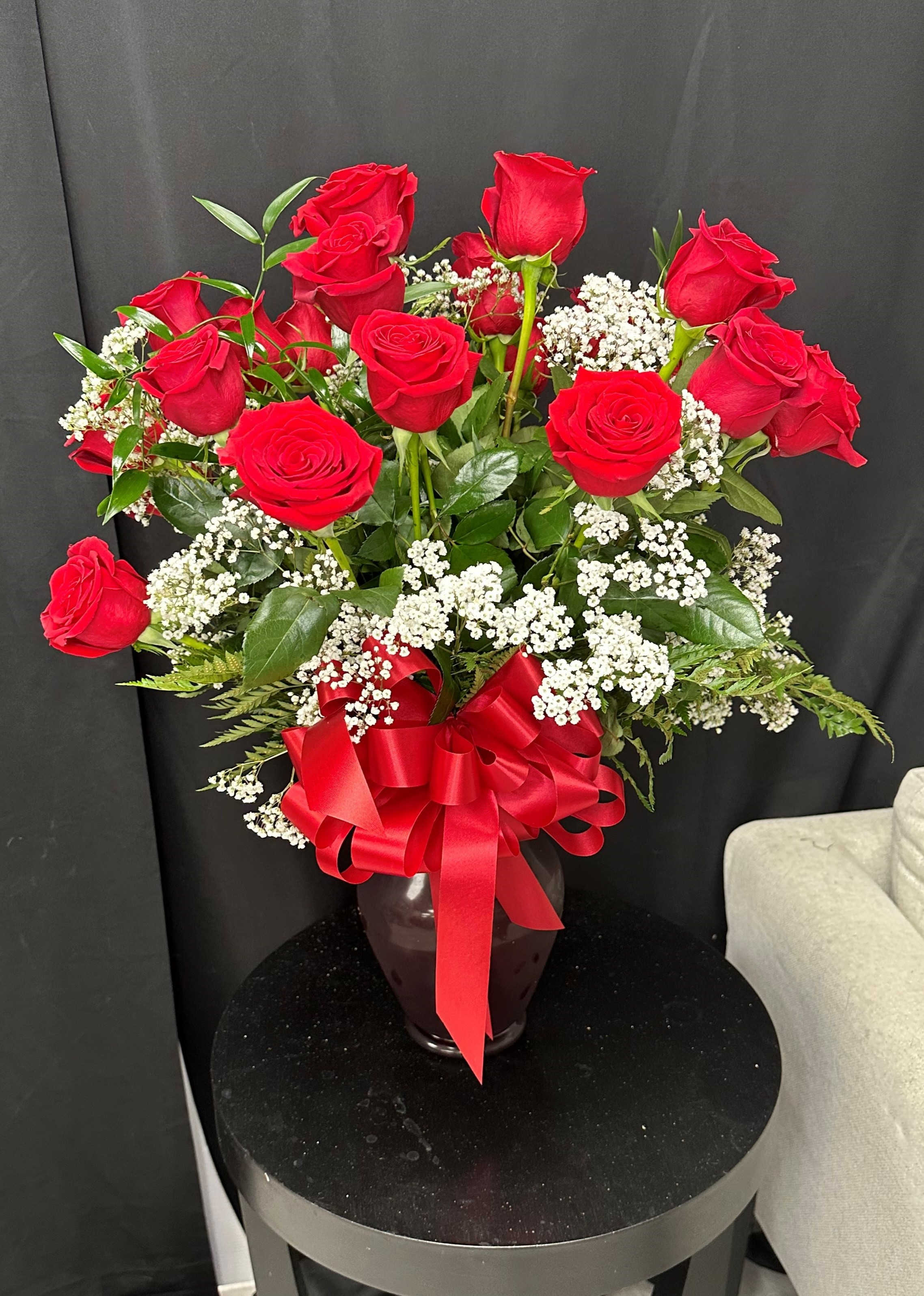 Two Dozen Long Stemmed Roses - Indulge in the timeless allure of romance with two dozen ravishing red roses. Each velvety bloom exudes passion and elegance, making a bold and unforgettable statement of love and devotion. Whether for a special occasion or simply to express affection, these exquisite roses are sure to leave a lasting impression of beauty and adoration.