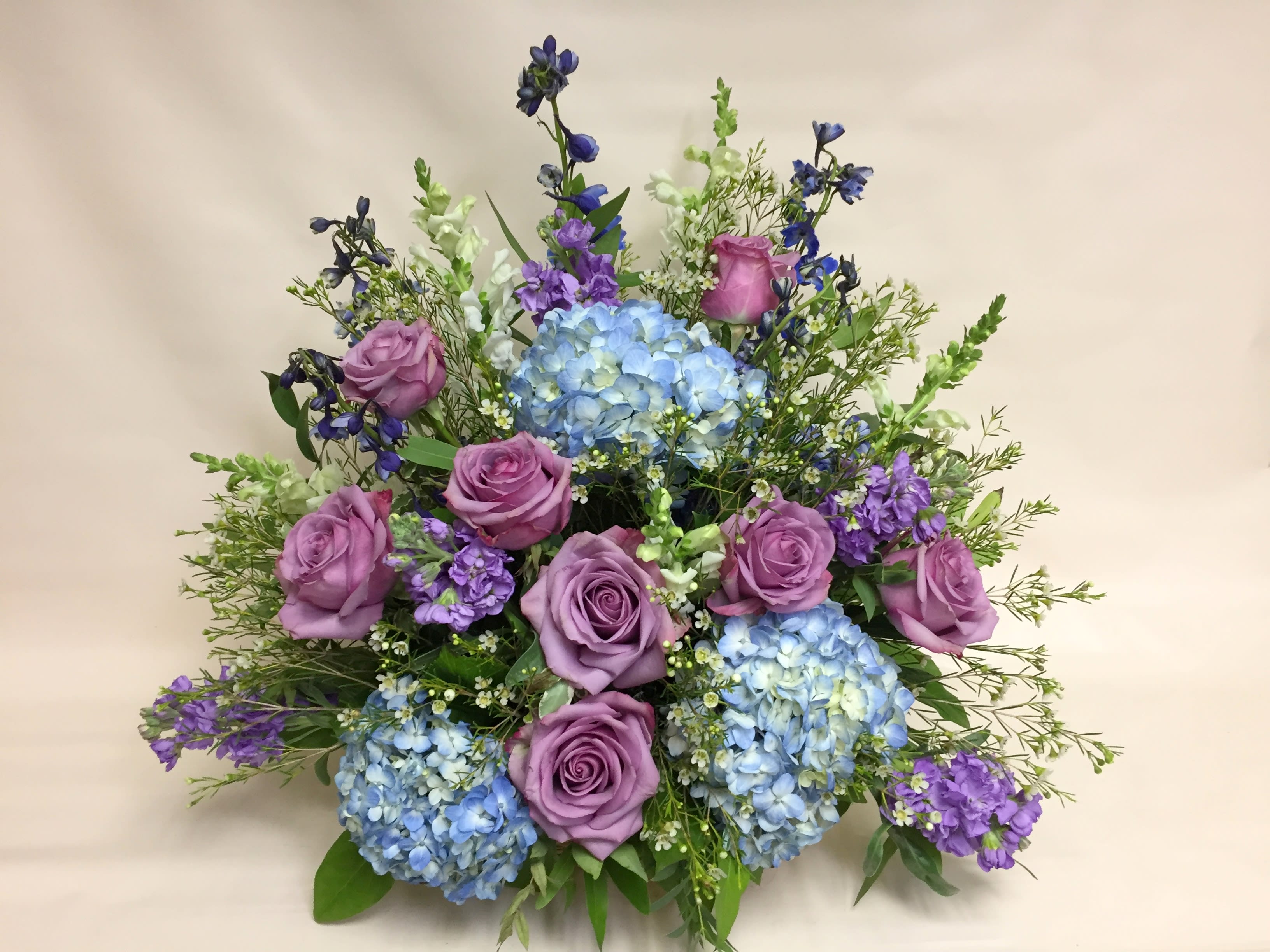 Lavender Thoughts Basket - Soothing lavender, respectful purple and compassionateblue  are combined beautifully in this basket overflowing with pretty flowers, sincerity and sympathy. A lovely way to share your thoughts and pay tribute to someone special. 