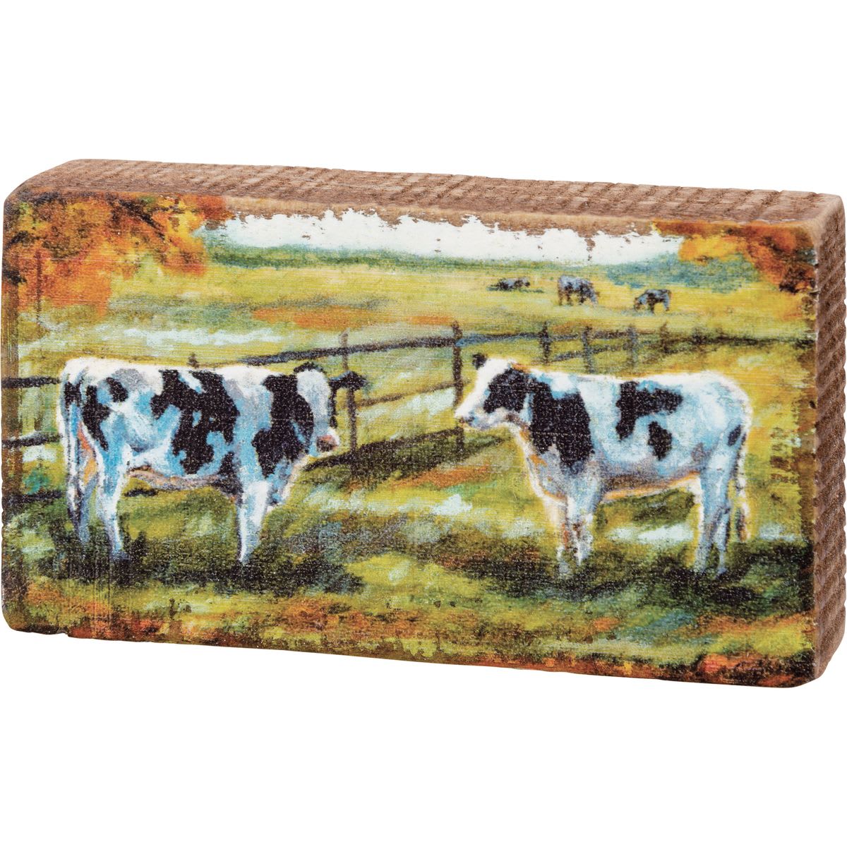 Rectangular decorative block with a painted cow scene