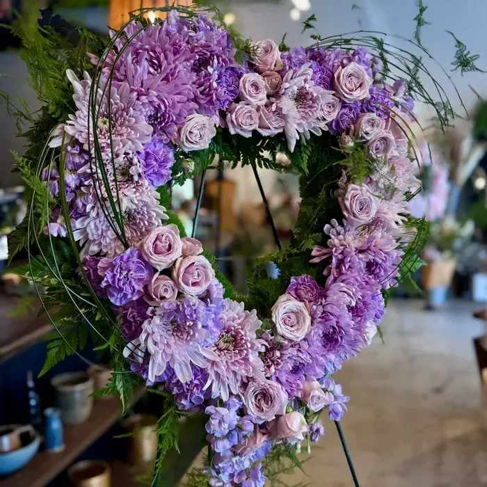 Lavender Heart - An open heart of all shades of lavender and purple roses. Product ID: 1496 