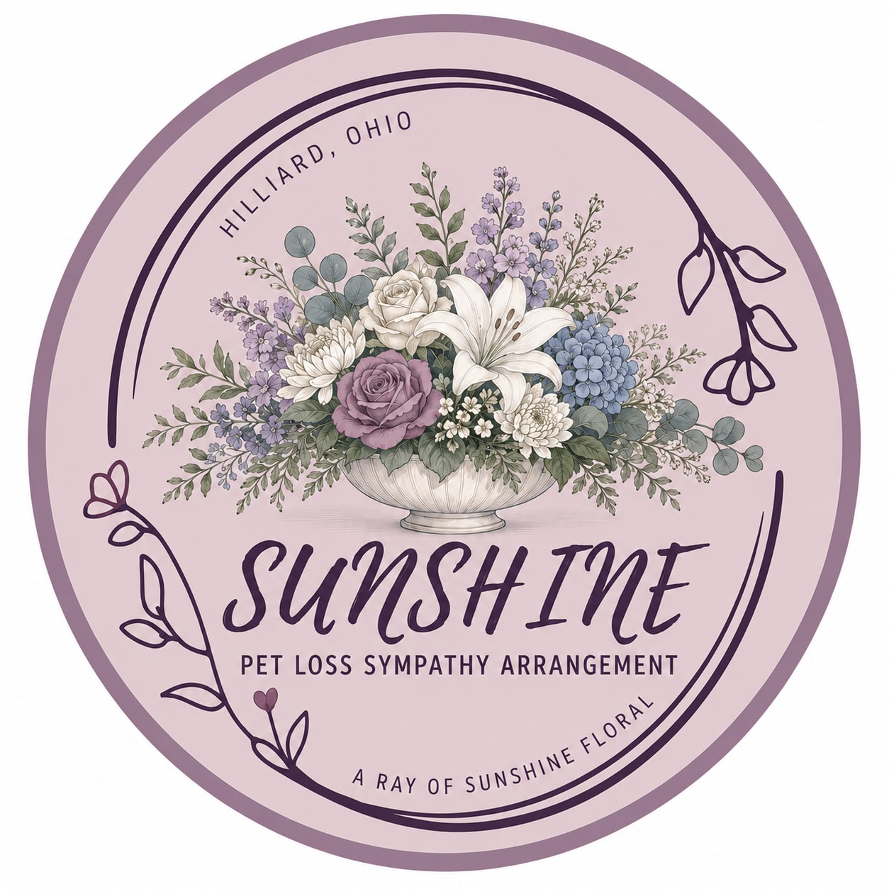 Round pink label with a floral arrangement illustration and pet loss sympathy text