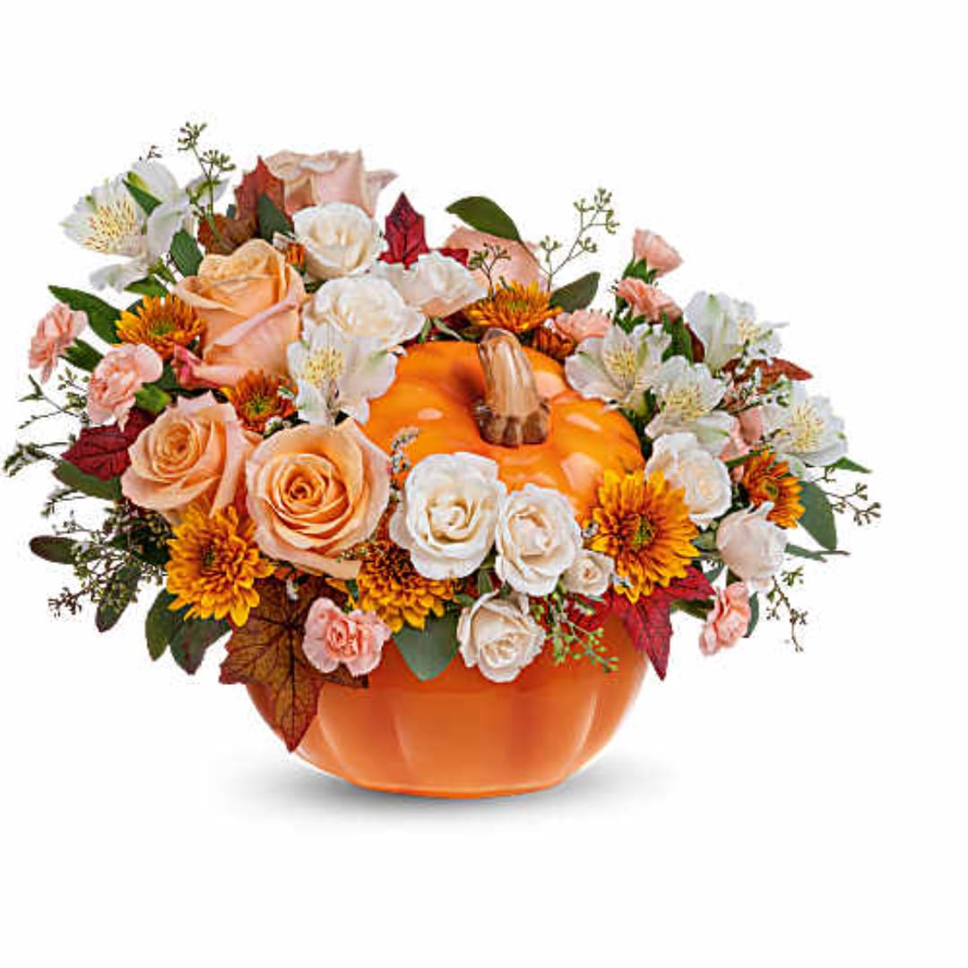 Pumpkin-shaped vase with peach and white flowers