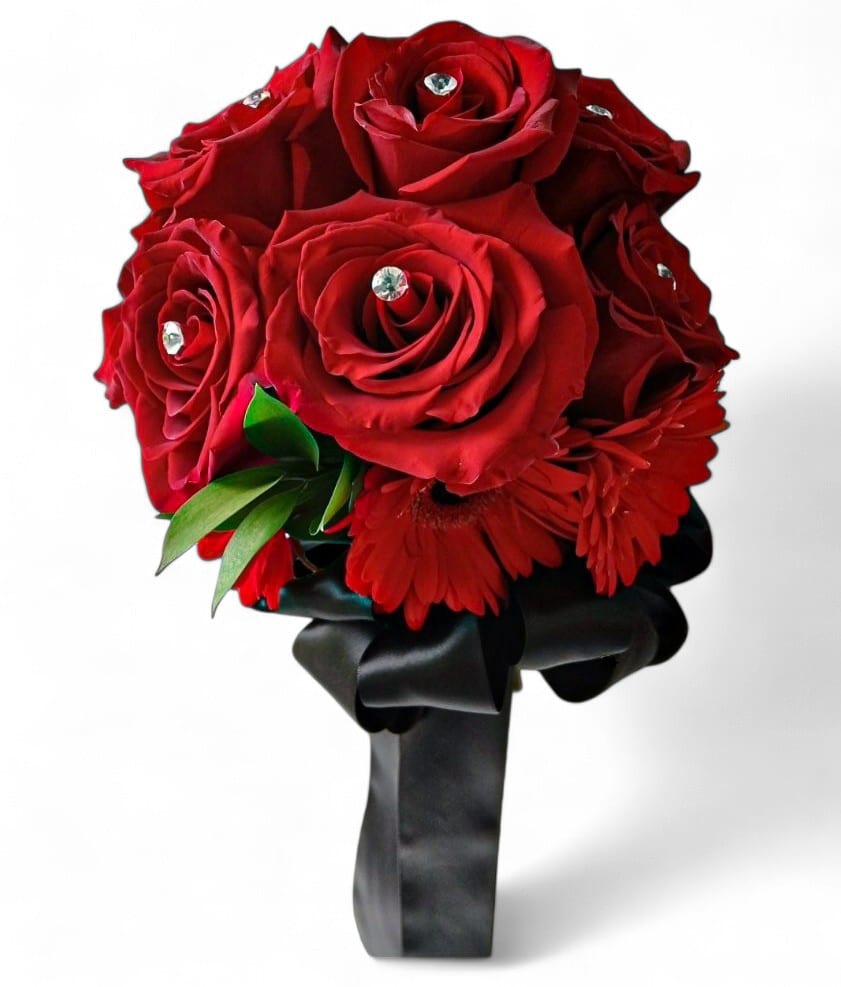 Red Rose Prom - Designer's choice; made beautifully from my blossom selection of the day roses and more arranged as a hand held style bouquet wrapped in ribbon of choice. Always made extra special every time. Show up in style at prom.