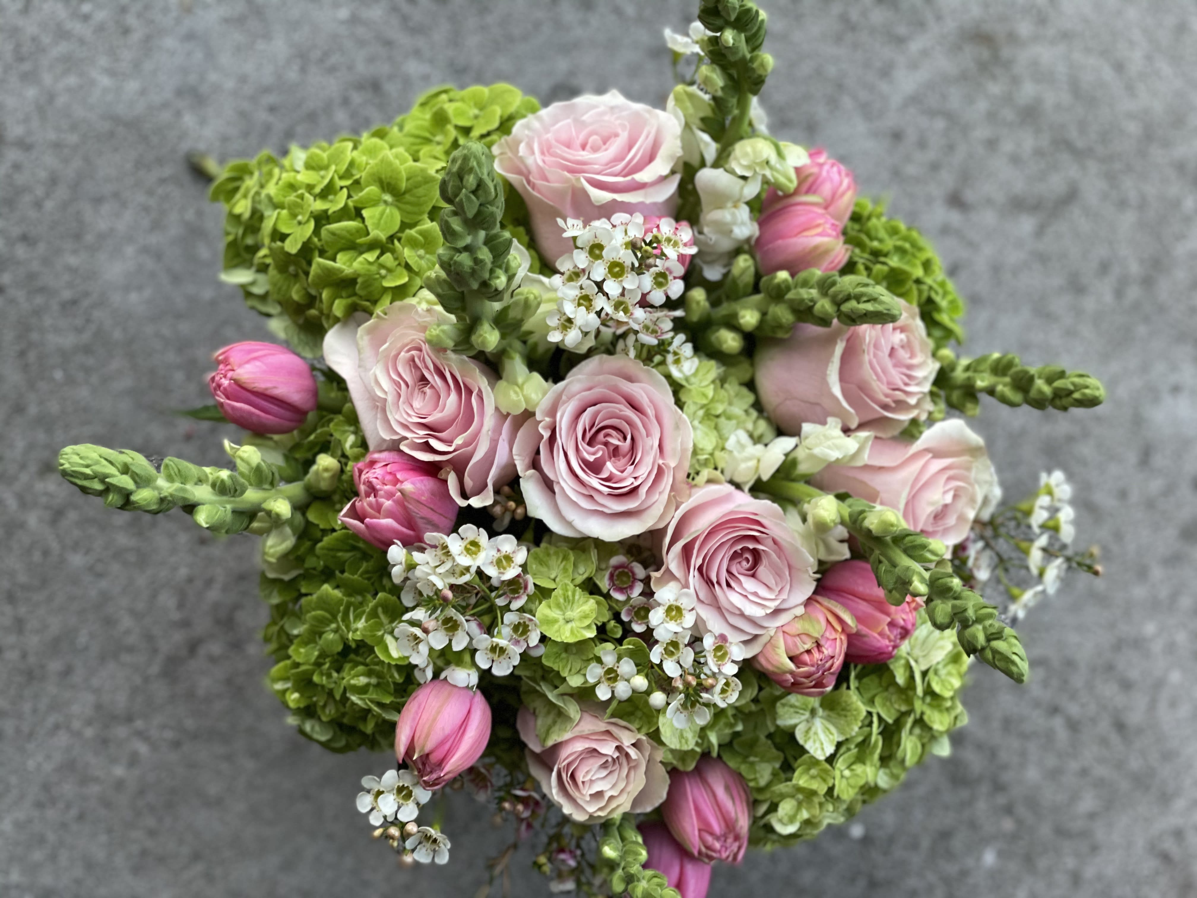 Drinking Watermelon  - This is a gorgeously bright BIG arrangement of the most perfect pink paired with bright apple green. This will bring a burst of sunshine indoors.  We will choose the flowers, you choose the size. This picture is representation of the color palette. While a lot of the flowers will be sourced, some may need to be exchanged with comparable or higher quality flowers.   Standard: Side table sized Deluxe : Dinner table sized Premium : Entryway or coffee table sized   Saturday and Same Day are available if you call the shop.   ** 415 751 2747 10:00AM -5:00PM MOTHER'S DAY DELIVERIES ARE LIMITED SO ORDER EARLY! PLEASE CALL THE SHOP TO PLACE ORDER IF THEY NEED TO BE TIMED*   
