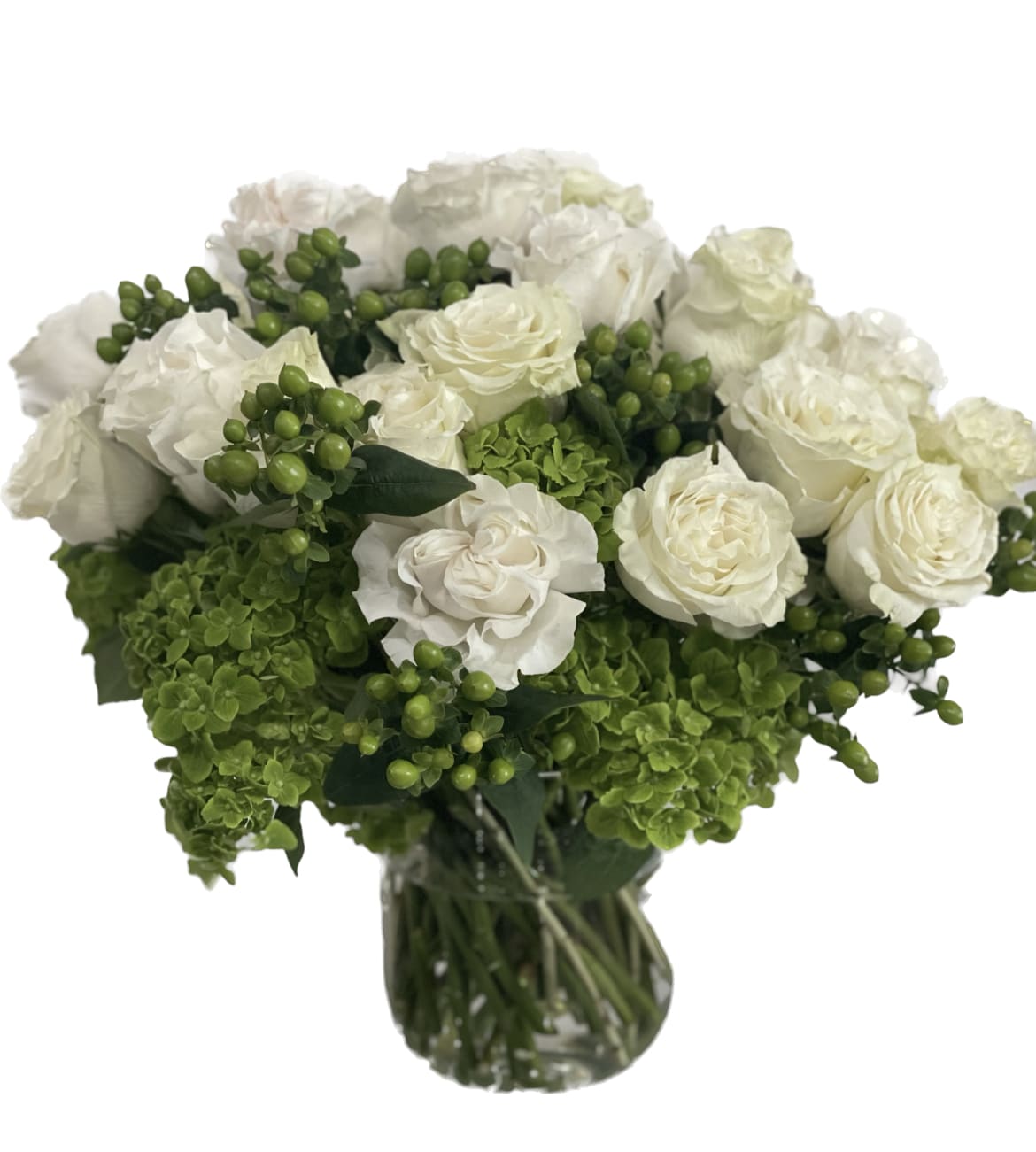 White roses and green hydrangeas in a glass vase